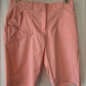 Tail Tech (Size 10) New without tags; Coral color; w/front and back pockets
